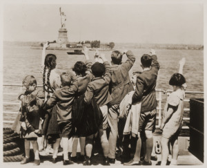 Jewish refugee children wave at the Statue of Liberty as the President Harding steams into New York harbor, United States Holocaust Memorial Museum, photo 96464