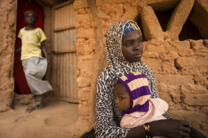 Fati Sabiue, 31, is one of the leader mothers for the mother care groups in the village. She has 5 children of her own, including daughter Malika, 20 months.(Quotes/story available)

She and other leader mothers were selected by the community. Mercy Corps works with local health workers to train them and support groups of fellow mothers. They teach proper health care and nutrition for children under 2, including cooking demonstrations to using food supplements that Mercy Corps provides (corn soy blend cereal) and new vegetables from the garden.
Niger, February 15, 2014. Dan Turke (village), Maradi (region).