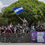 People demonstrate near a cobblestone barricade in Managua, Nicaragua, April 21. Pope Francis called for an end to violence in Nicaragua after several days of protests against proposed social security legislation led to the deaths of more than two dozen people. (CNS photo/Jorge Torres, EPA) See POPE-NICARAGUA-PROTESTS April 23, 2018.